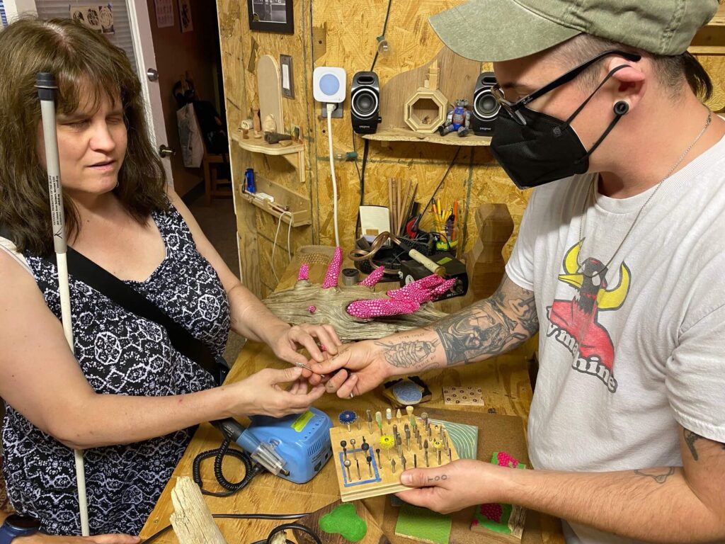 Cheryl and Leo in their workshop